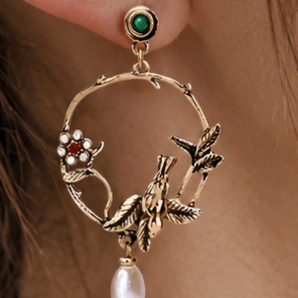 Anthropologie Gold-Tone Hummingbird Hoop Earrings with Green and Pearl Accents
